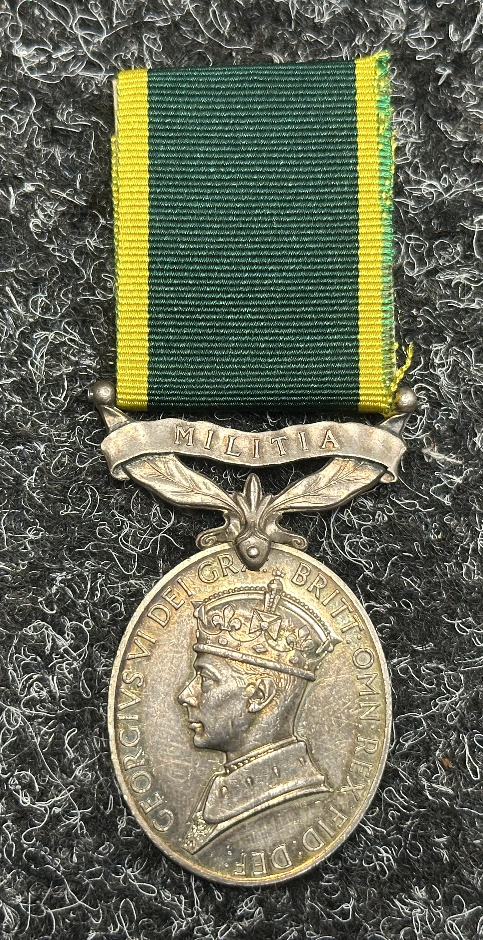 WW2 British Territorial Efficiency Medal with Militia Clasp to "2339233 Signalman FT Janaway, Royal Signals". Complete with modern replacement ribbon.