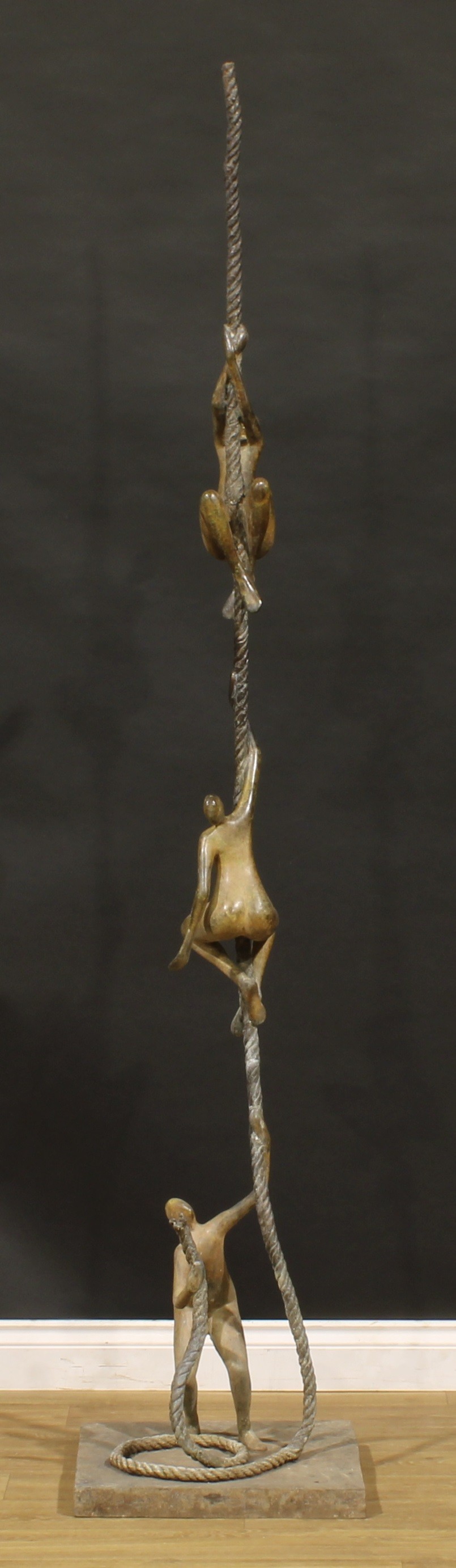 Tolla Inbar (German/Israeli b.1958) A large bronze sculpture, Aspiration Trio, from the Enlarging Rope series, 216cm high, the base 43cm x 46cm  Provenance: deceased collector estate believed purchased from the artist.   Tolla is considered one of the top Israeli artists working today.  Born in Germany in 1958, Tolla attended the Merz school in Stuttgart until 1971.  There she specialized in the art of ceramics and sculpture, developing her skill in an art form that would become a lifelong love story. Between 1977 - 1984 she studied at Bustan Institute and at Avni Institute of Arts, where she worked in stone and wood with well-known Russian sculptors.  During these years of experimentation with varying materials, she transformed her style from realistic and figurative to more expressive and semi-abstract.  Tolla describes her artistic process as a “relentless drive to keep creating different expressions of the ancient human spiritual quest for the divine.”  This is evident in her rope sculptures which are both unique and naturalistic, balanced and fluid. In combining contrasting materials such as wood, metal, and bronze she is able to reflect tension or what she refers to as “spiritual optimism.”  Tolla’s conviction is that, “our world is mostly composed of light and energy so that theoretically the victory of energy (spirit) over matter is only a question of time.”  Tolla's works can be found in numerous private collections throughout Germany, France and the United States.  ARR apply to this lot.