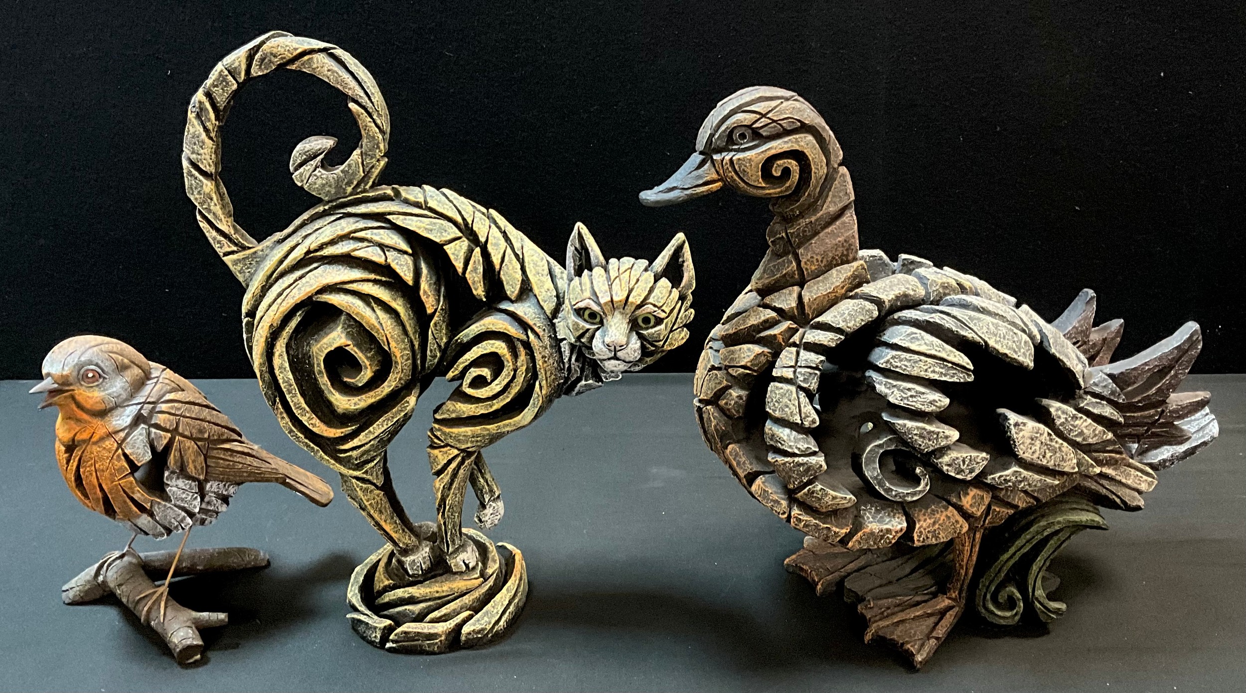 Sculpture - An ‘Edge’ Yellow Cat, 39cm high;  Edge duck, and robin, (3).