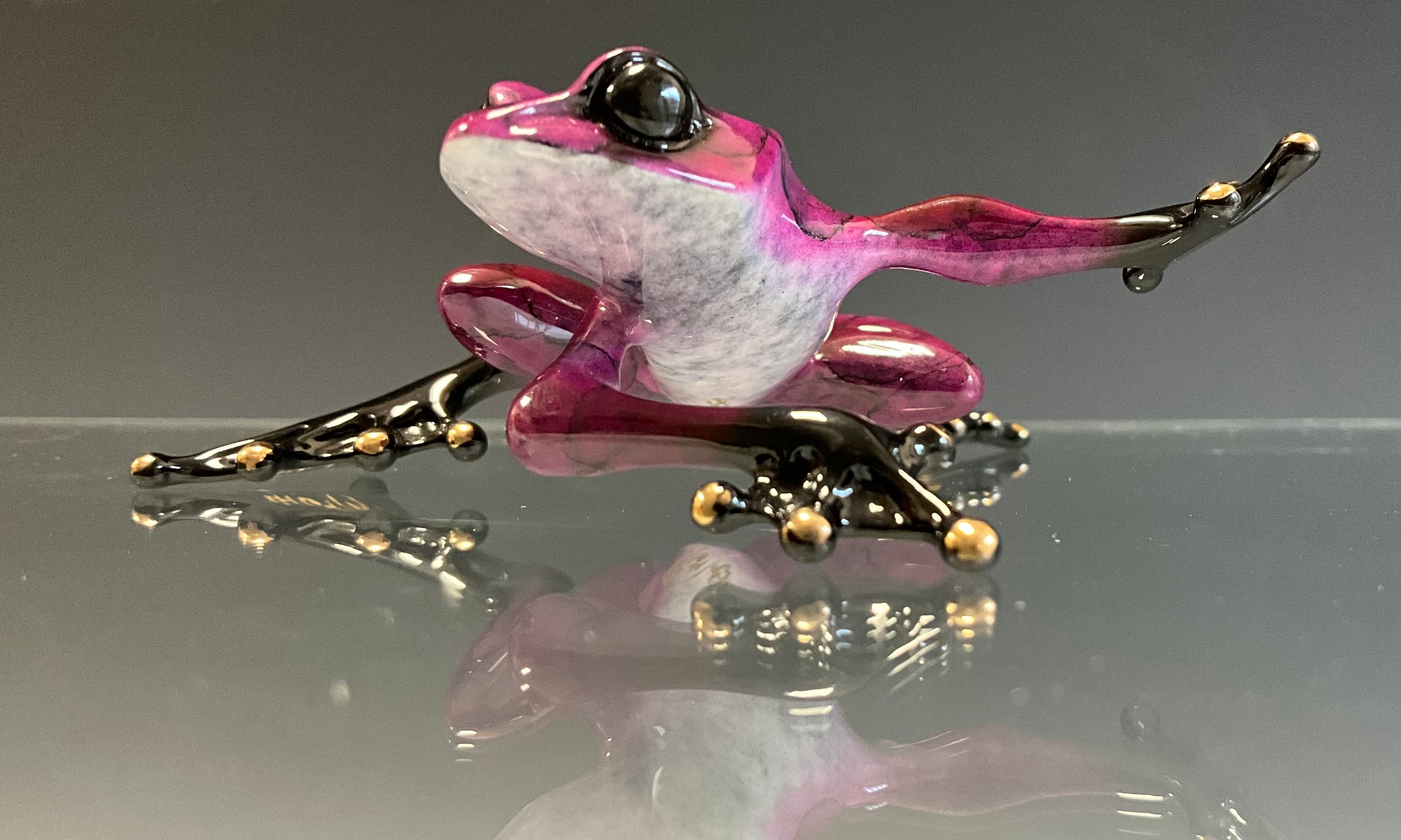 Tim 'Frogman' Cotterill; a limited edition lost wax cast bronze model 'Electra', of a Frog stalking with purple and black hue patina, variant number 167/250, limited edition number 4164/5000, signed and impressed marks, approx 9cm long, 10cm wide, with certificate Mulberry Hall, (incorrectly hand written numbers) dated 24/09/09