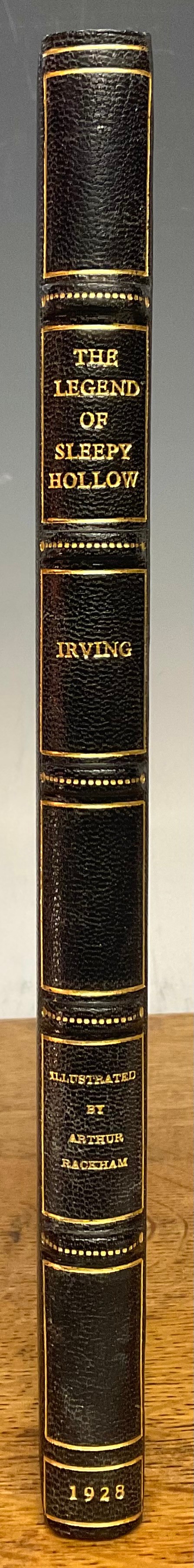 Irving (Washington, 1783-1859), The Legend of Sleepy Hollow, illus. by Arthur Rackham, limited edn. no. 86/250, London, George Harrap 1928, 4to, 103pp on hand-cut paper, signed by Arthur Rackham, frontis and 7 tipped in coloured plates and numerous vignettes, coloured illustrated endpapers by Rackham, bound full black Morocco with gilt lines and titles, five raised bands and gilt titles to spine (light browning to edges and a few light stains) (1)