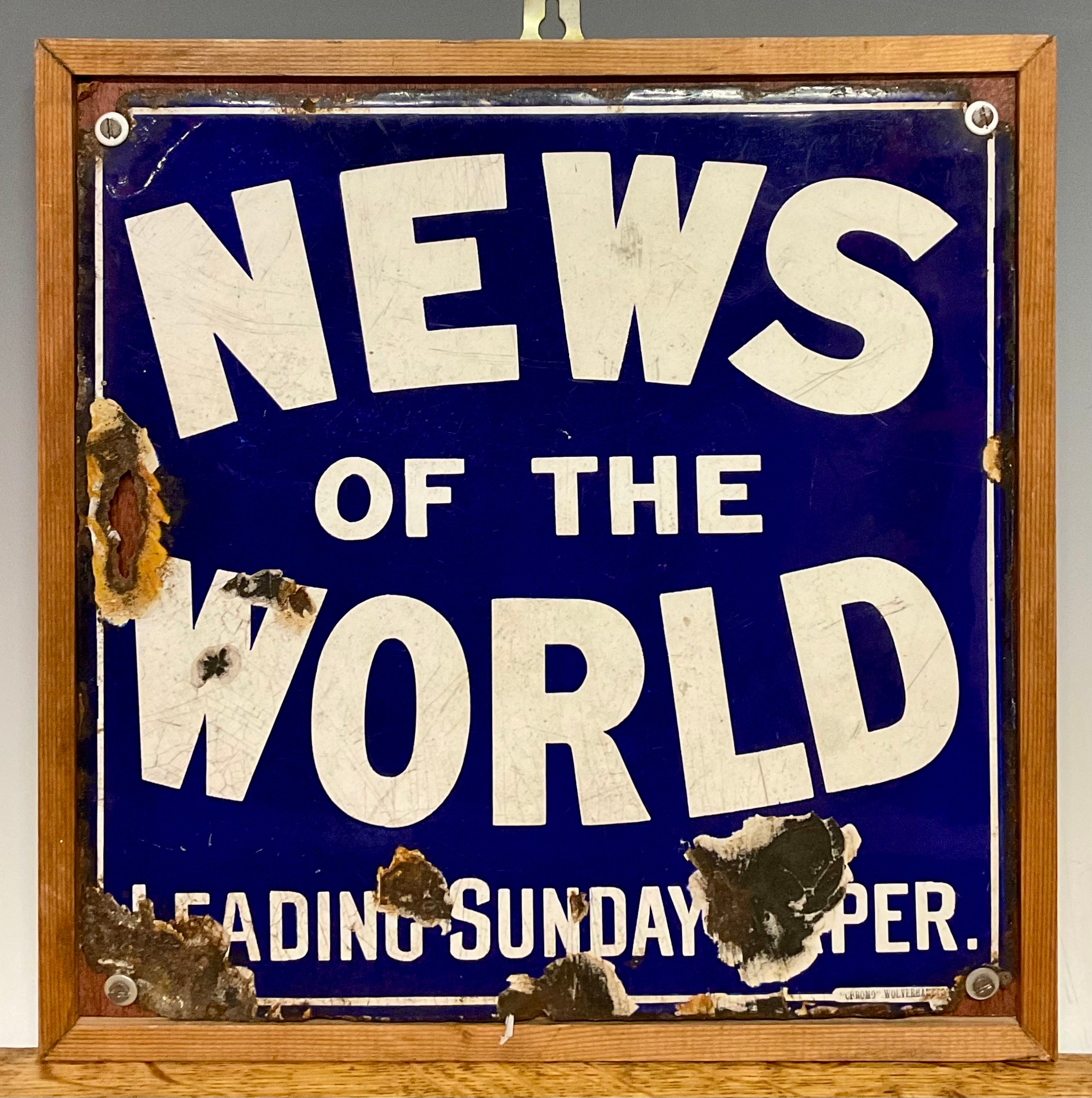 Advertising - an enamel sign, News of the World Leading Sunday Paper, mounted for display, 30cm x 30.5cm