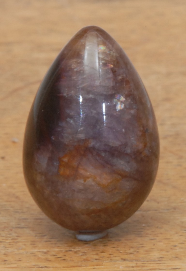 A Derbyshire Blue John polished egg, 4.5cm