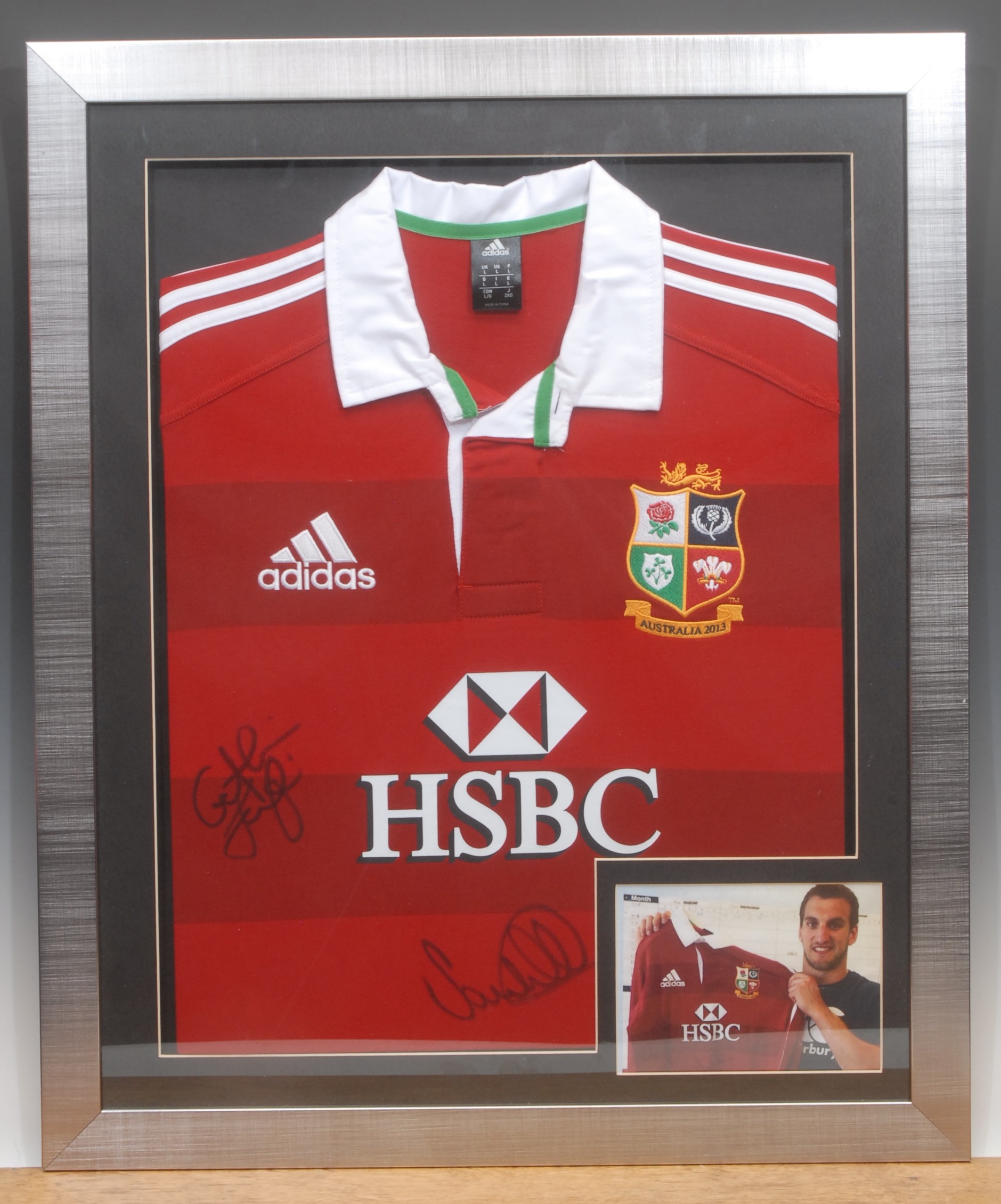 A British and Irish Lions Australia Tour 2013 Rugby shirt, signed by captain Sam Warburton and Gethin Jenkins, framed, accompanied by Photographic provenance of Sam Warburton with the signed shirt, 58cm x 45cm