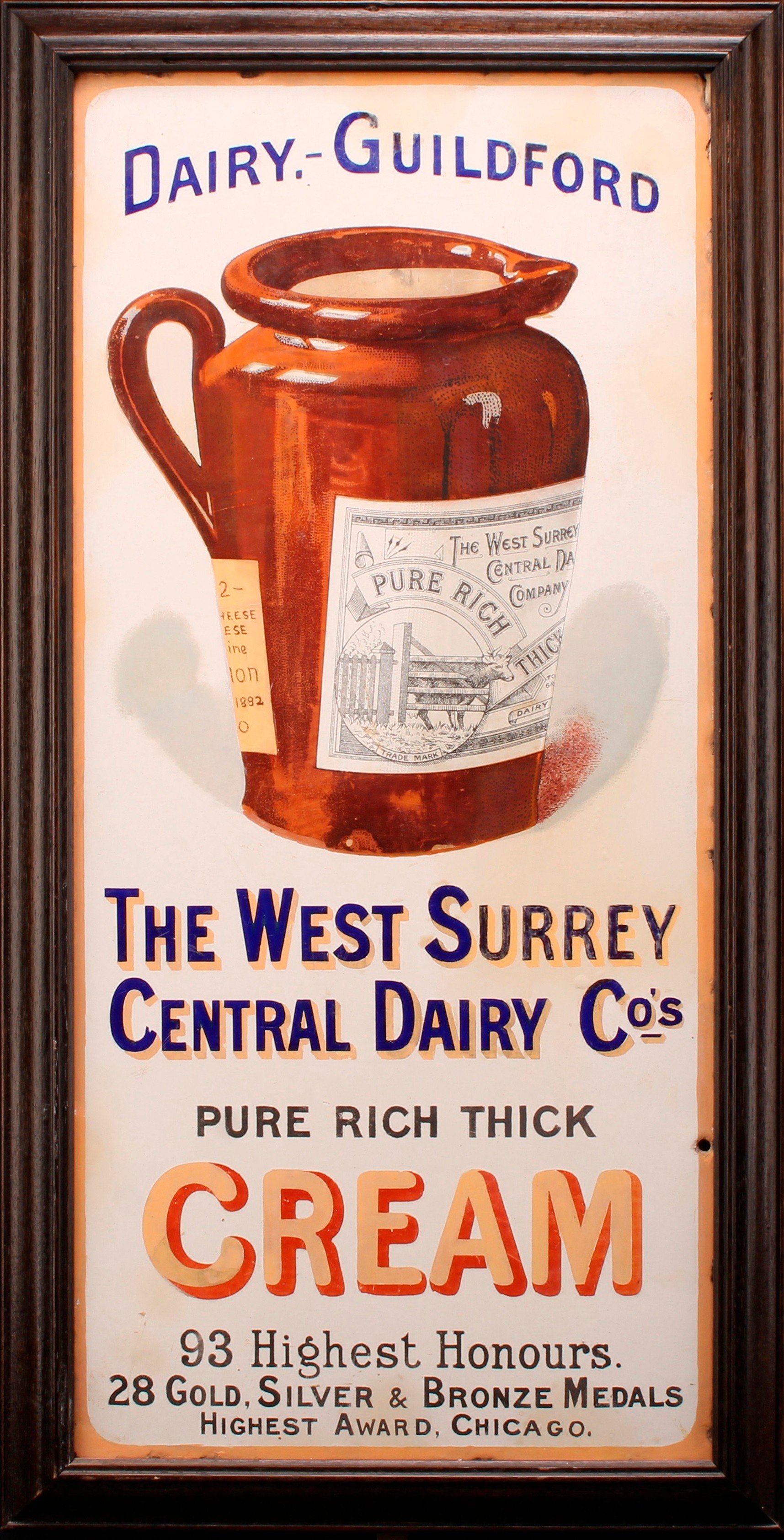 Advertising - an early 20th century rectangular pictorial enamel sign, West Surrey Central Dairy Co's Pure Rich Thick Cream, Guildford, illustrated with a labelled cream jug, 59cm x 27cm