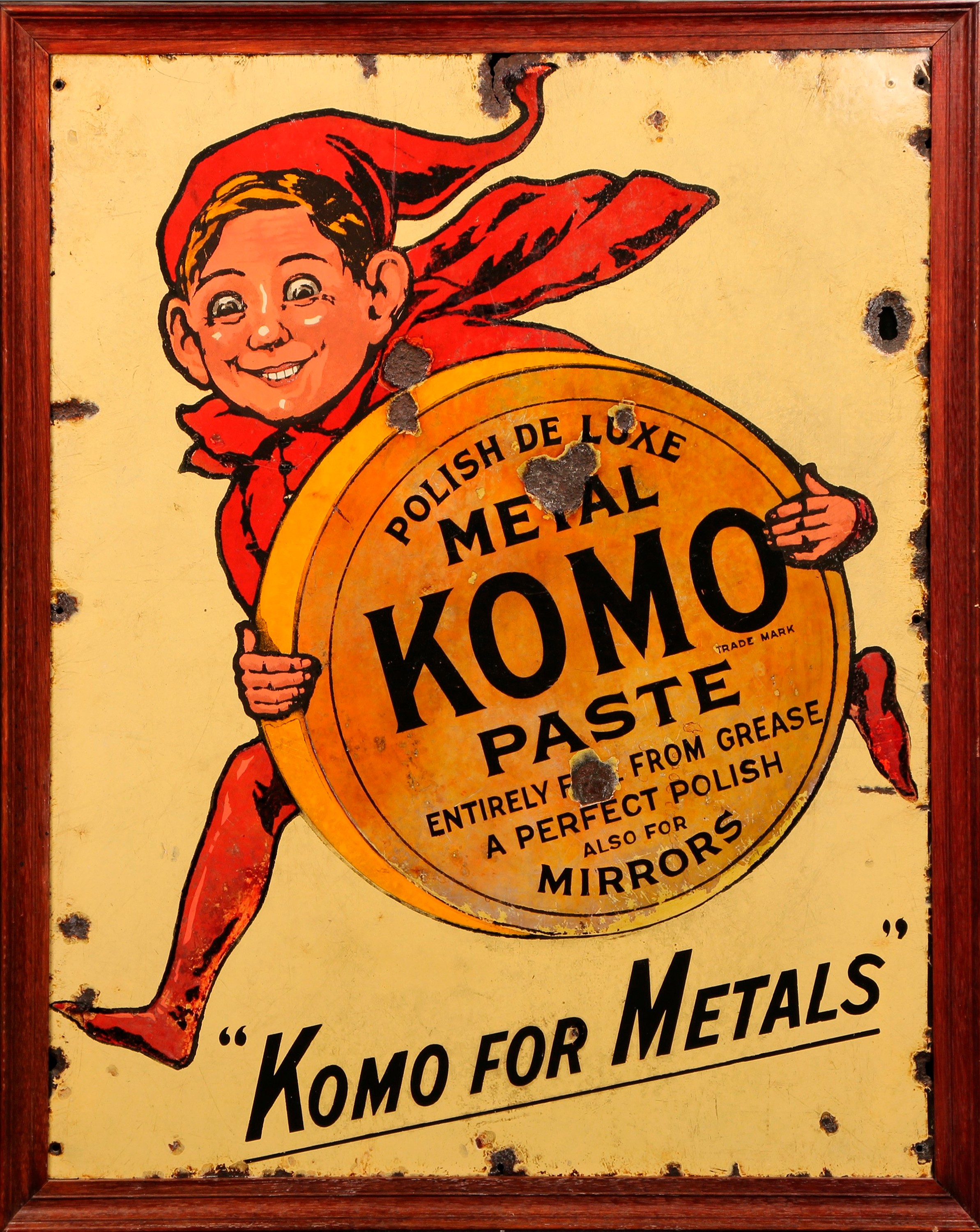Advertising - an early 20th century rectangular pictorial enamel sign, Komo Metal Paste, Polish De Luxe, illustrated with an imp and an oversized labelled tin, 76.5cm x 61cm