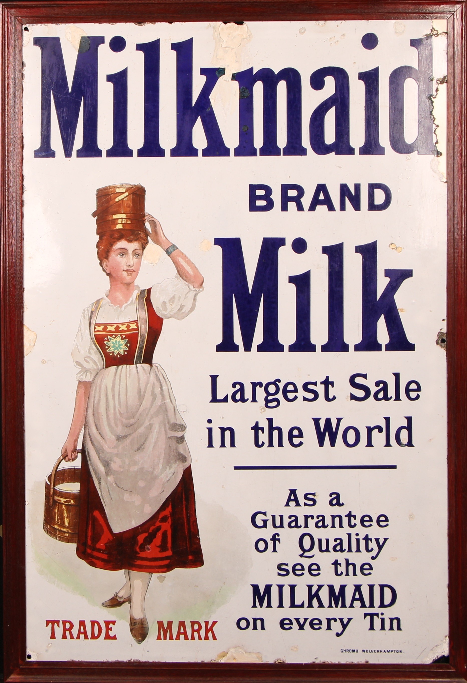 Advertising - an early 20th century rectangular pictorial enamel sign, Milkmaid Brand Milk, Largest Sale in the World, illustrated with a milkmaid carrying pails of milk, by Chromo, Wolverhampton, 121cm x 81cm