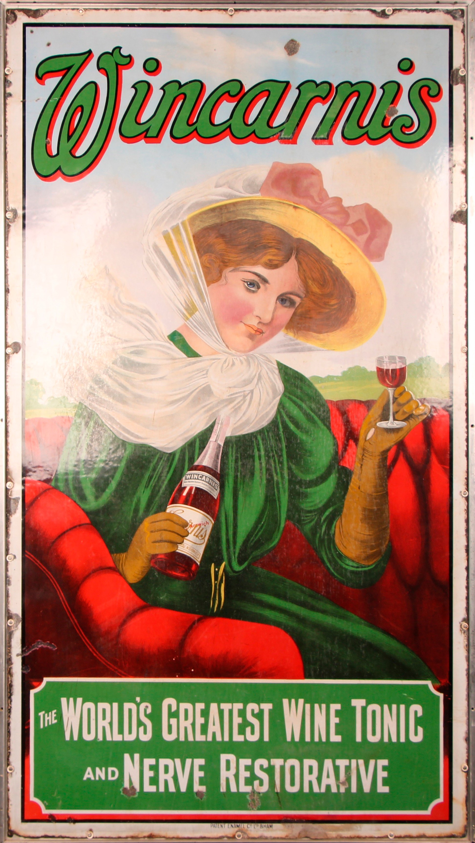 Advertising - a large early 20th century rectangular pictorial enamel sign, Wincarnis, The World's Greatest Wine Tonic and Nerve Restorative, decorated with a lady of fashion taking a drink, 164cm x 102cm