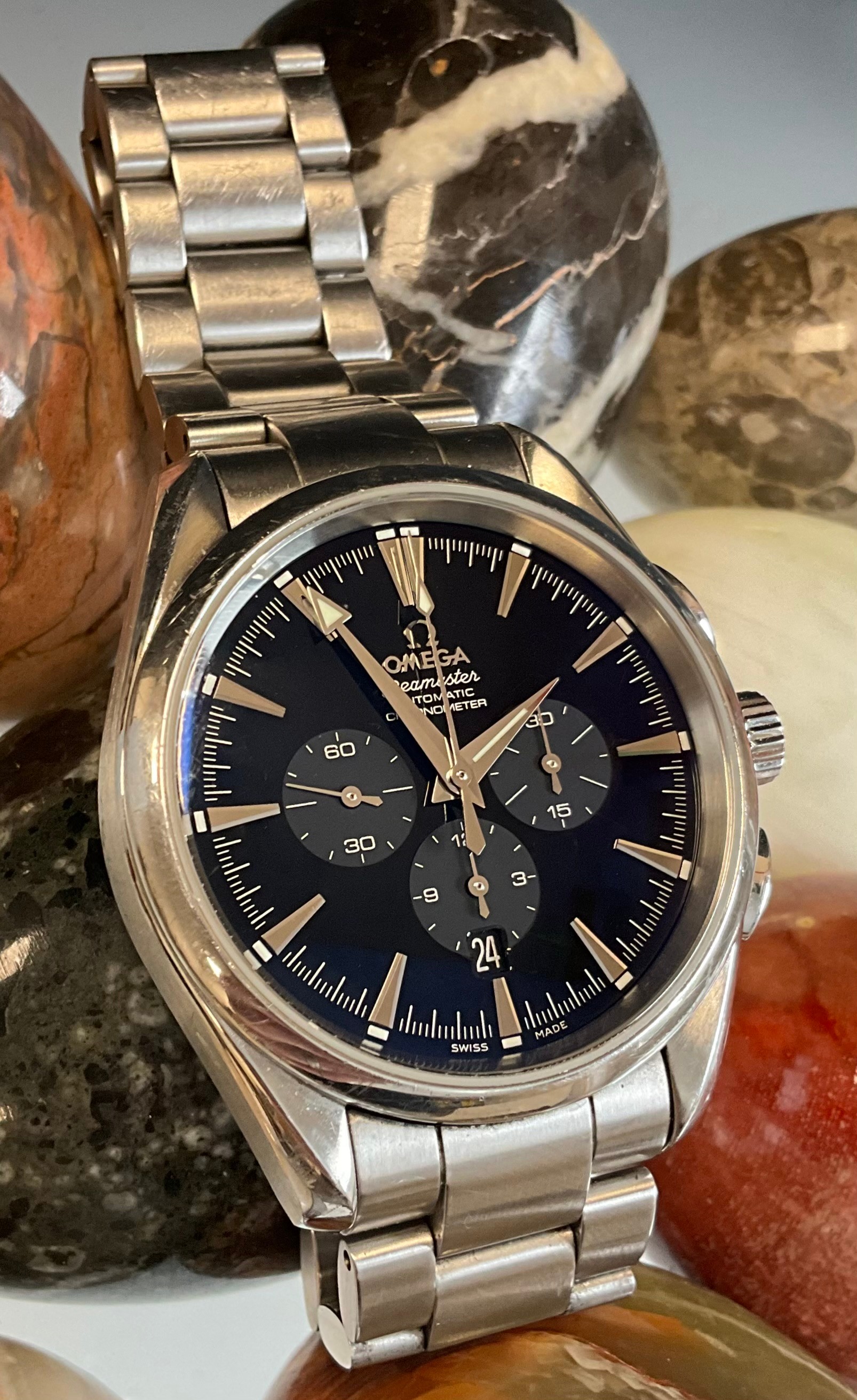 Omega  - a Seamaster automatic Chronometer wristwatch, ref 25125000, deep blue black dial, three subsidiary registers, block baton indices, centre seconds, automatic 3301 cal movement, serial no 78135***, two oval pushers, 42mm diameter case, original brushed strap, boxed with warranty card, instruction book, Omega Boutique receipt dated 28/12/2008 with travel case